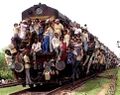 Overloaded train hanging india.jpg