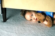 Girl under bed.jpg