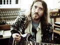 John Frusciante playing the guitar.jpg
